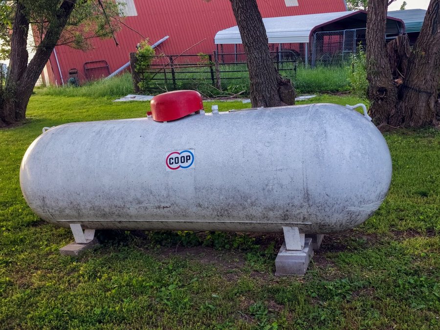 Huron Generator Pros standby generator propane tank on a rural Huron County farm property near Goderich, Ontario